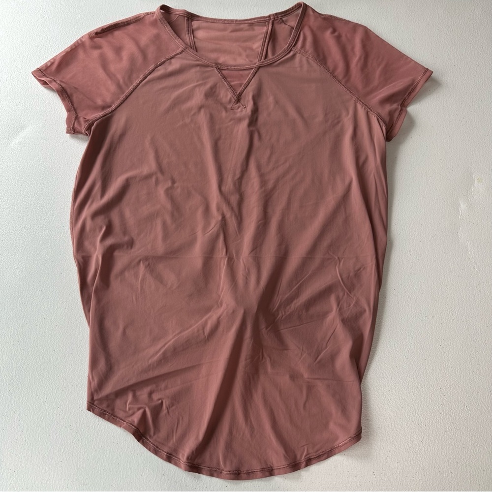 (1047) Lululemon Short Sleeve Size 4